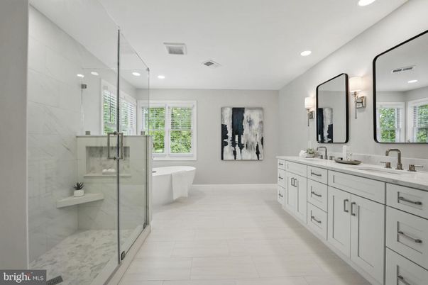 Bathroom, Dual Sink Vanities, Free Standing Baths, Glass Shower, Interior, Marble Walls, Recessed Lighting