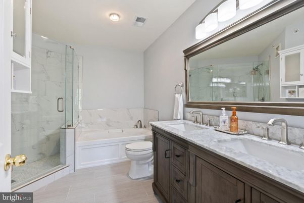 Bathroom, Dual Sink Vanities, Glass Shower, Interior, Marble Walls, Recessed Lighting