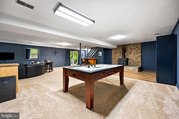 Billiard Table, Game Room, Interior, Pendant Lights, Recessed Lighting, Stone Walls, Wood Texture Flooring