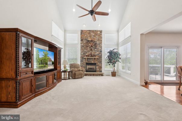 Fireplace, Interior, Recessed Lighting, Stone Walls, Wood Texture Flooring