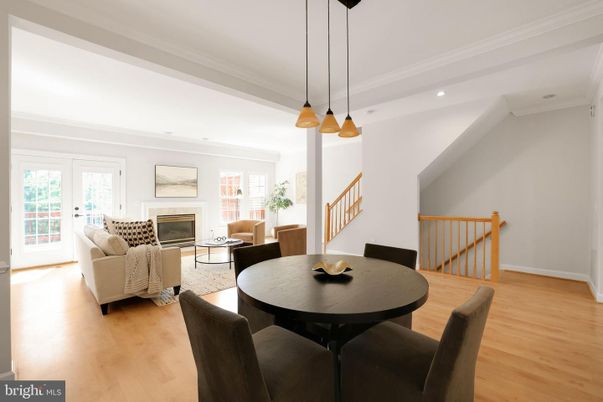 Dining room, Fireplace, Interior, Living room, Pendant Lights, Recessed Lighting, Wood Texture Flooring