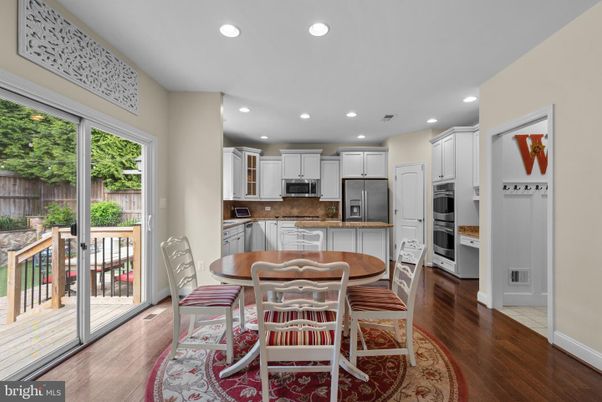Dining room, Interior, Kitchen, Recessed Lighting, Stainless Steel Appliances, Wood Texture Flooring