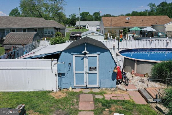 Exterior, Pool, Solar Panels