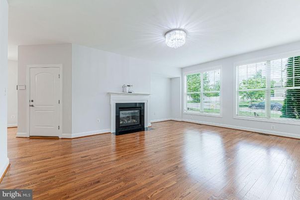 Chandelier, Empty room, Fireplace, Interior, Wood Texture Flooring