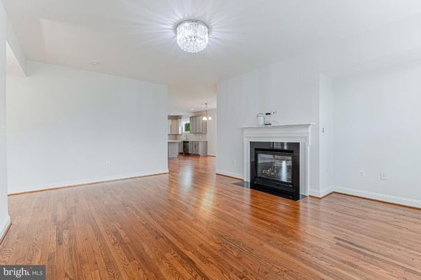 Empty room, Fireplace, Interior, Pendant Lights, Wood Texture Flooring