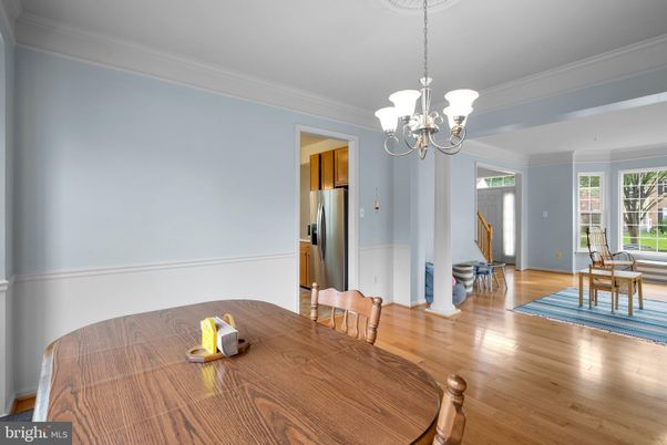 Chandelier, Dining room, Interior, Kitchen, Stainless Steel Appliances, Wood Texture Flooring