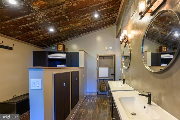 Bathroom, Dual Sink Vanities, Interior, Recessed Lighting, Wood Texture Flooring