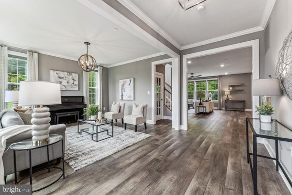 Chandelier, Fireplace, Interior, Living room, Piano, Recessed Lighting, Wood Texture Flooring