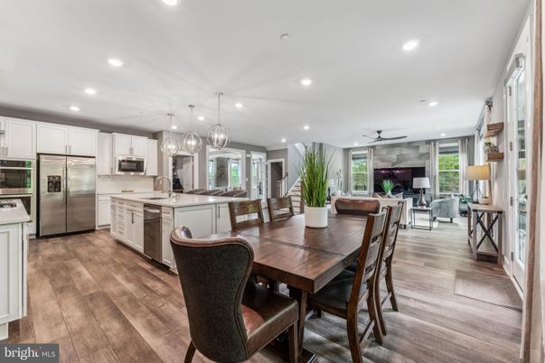 Dining room, Interior, Kitchen, Living room, Pendant Lights, Recessed Lighting, Stainless Steel Appliances, Wood Texture Flooring