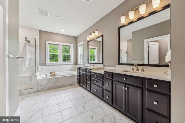 Bathroom, Dual Sink Vanities, Interior, Marble, Marble Walls, Recessed Lighting
