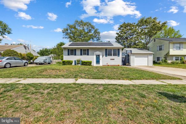 Attached, Exterior, Facade, Solar Panels, Raised Ranch