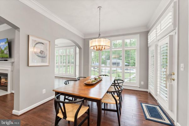 Chandelier, Dining room, Fireplace, Interior, Wood Texture Flooring