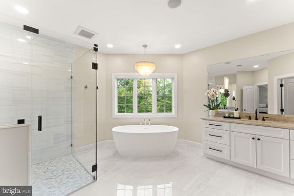 Bathroom, Dual Sink Vanities, Free Standing Baths, Glass Shower, Interior, Marble, Pendant Lights, Recessed Lighting