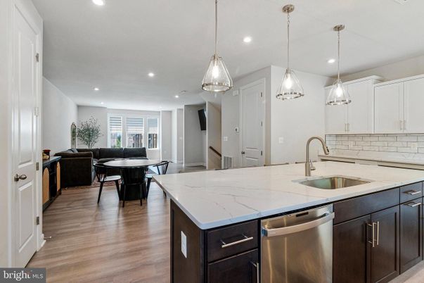 Dining room, Interior, Kitchen, Living room, Pendant Lights, Recessed Lighting, Stainless Steel Appliances, Wood Texture Flooring
