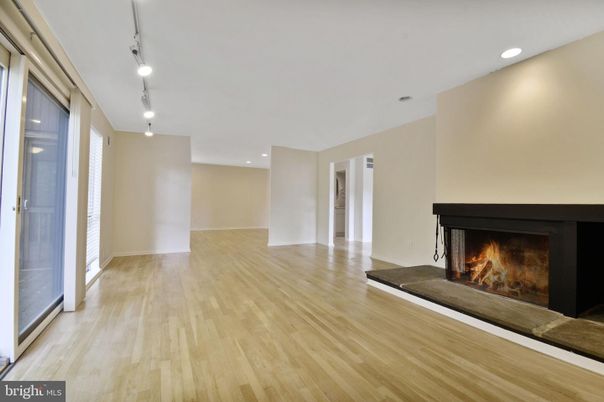 Empty room, Fireplace, Interior, Pendant Lights, Recessed Lighting, Wood Texture Flooring