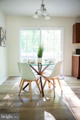 Chandelier, Dining room, Interior, Wood Texture Flooring