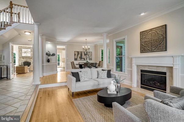 Chandelier, Dining room, Fireplace, Interior, Living room, Recessed Lighting, Wood Texture Flooring
