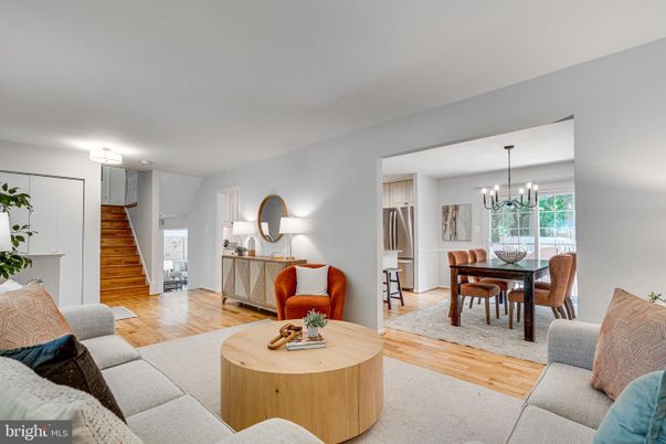 Chandelier, Dining room, Interior, Kitchen, Living room, Stainless Steel Appliances, Wood Texture Flooring