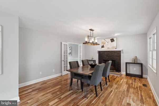 Dining room, Fireplace, Interior, Pendant Lights, Wood Texture Flooring