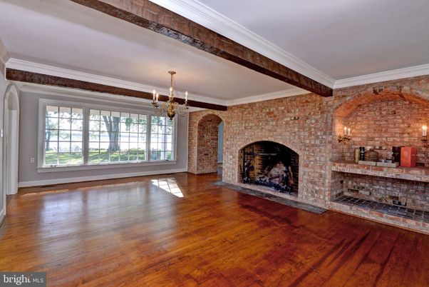 Chandelier, Empty room, Fireplace, Interior, Stone Walls, Wood Texture Flooring