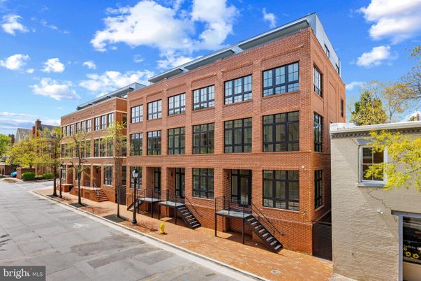 Exterior, Facade, Brick Facade, Condo Building