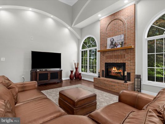 Fireplace, Interior, Living room, Recessed Lighting, Stone Walls, Wood Texture Flooring
