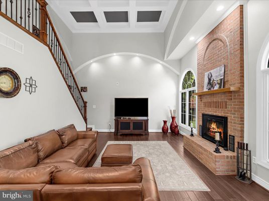 Fireplace, Interior, Living room, Recessed Lighting, Stone Walls, Wood Texture Flooring