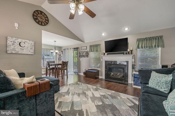 Chandelier, Dining room, Fireplace, Interior, Living room, Recessed Lighting, Wood Texture Flooring