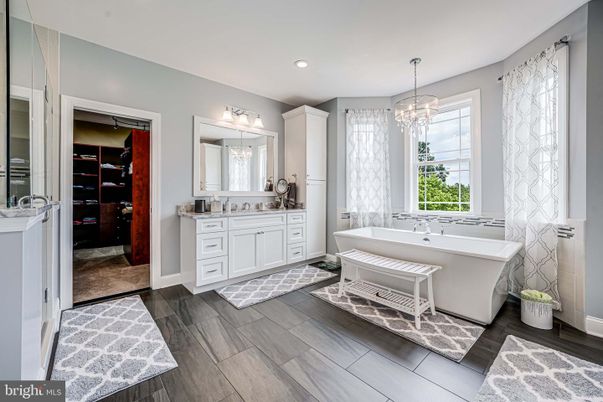 Bathroom, Chandelier, Dual Sink Vanities, Free Standing Baths, Interior, Recessed Lighting, Walk-in Closets, Wood Texture Flooring