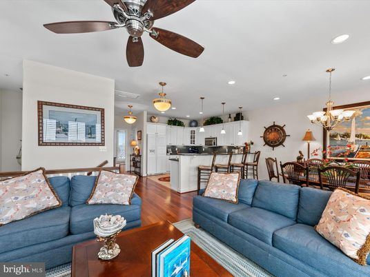 Chandelier, Dining room, Interior, Kitchen, Living room, Pendant Lights, Recessed Lighting, Stainless Steel Appliances, Wood Texture Flooring
