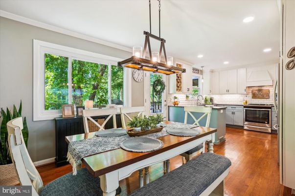 Dining room, Interior, Kitchen, Pendant Lights, Recessed Lighting, Stainless Steel Appliances, Wood Texture Flooring