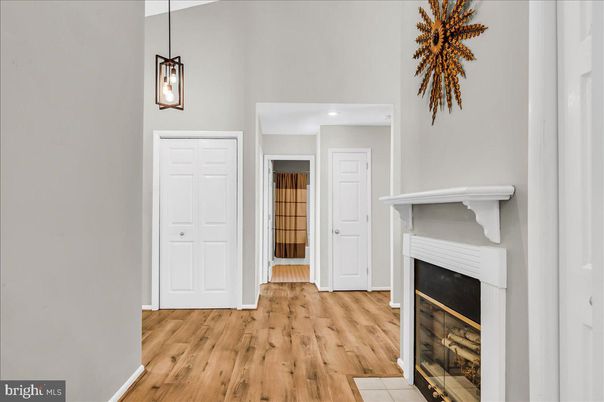 Fireplace, Interior, Pendant Lights, Recessed Lighting, Wood Texture Flooring