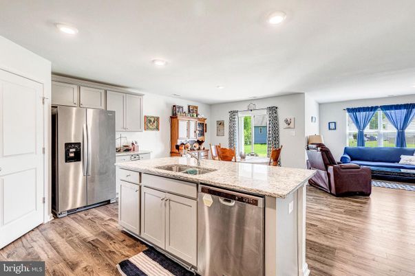 Dining room, Interior, Kitchen, Living room, Recessed Lighting, Stainless Steel Appliances, Wood Texture Flooring