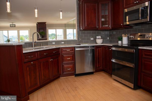 Interior, Kitchen, Pendant Lights, Stainless Steel Appliances, Wood Texture Flooring