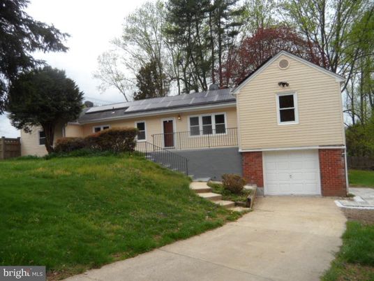 Attached, Exterior, Facade, Brick Facade, Solar Panels, Split Level
