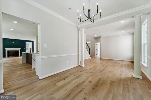 Chandelier, Empty room, Fireplace, Interior, Recessed Lighting, Wood Texture Flooring