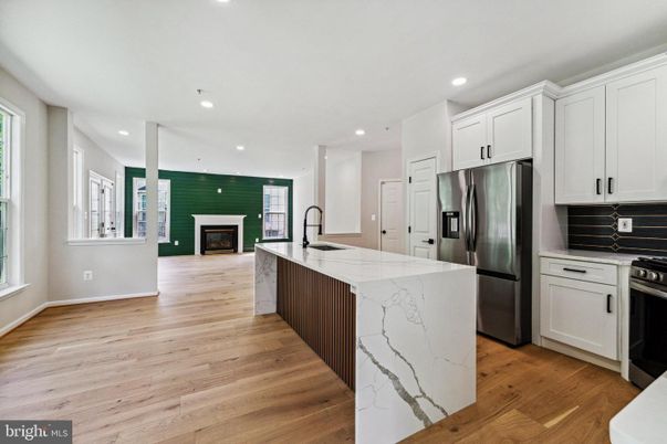 Fireplace, Interior, Kitchen, Recessed Lighting, Stainless Steel Appliances, Wood Texture Flooring
