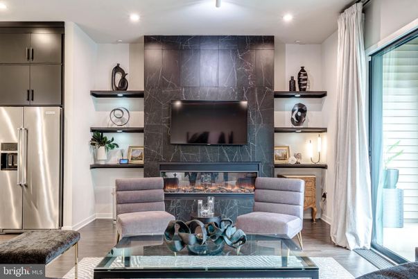 Fireplace, Interior, Marble Walls, Recessed Lighting, Wood Texture Flooring