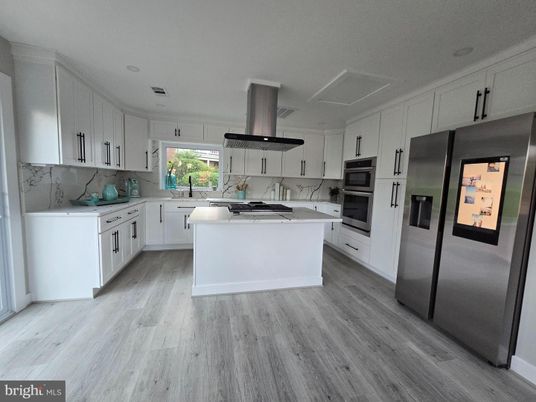 Interior, Kitchen, Marble Walls, Stainless Steel Appliances, Wood Texture Flooring