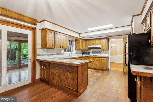 Interior, Kitchen, Tile Countertops, Wood Texture Flooring