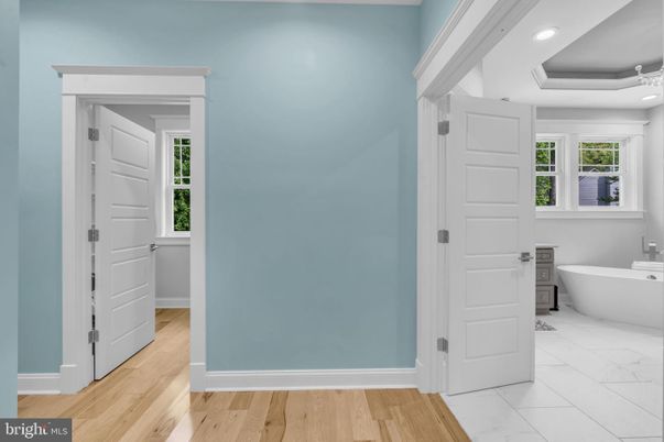 Bathroom, Free Standing Baths, Interior, Marble, Recessed Lighting, Wood Texture Flooring