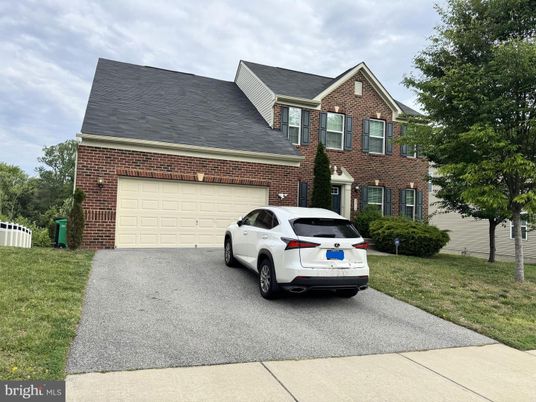 Attached, Exterior, Facade, Brick Facade, Tudor Revival