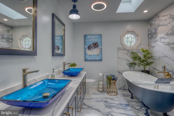 Bathroom, Dual Sink Vanities, Free Standing Baths, Interior, Marble, Marble Walls, Recessed Lighting