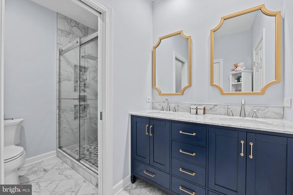 Bathroom, Dual Sink Vanities, Glass Shower, Interior, Marble, Marble Walls