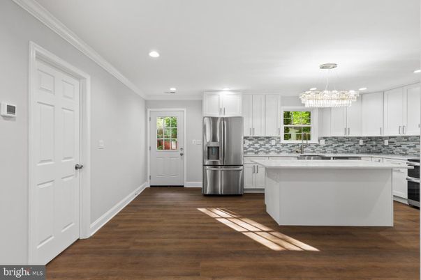 Chandelier, Interior, Kitchen, Recessed Lighting, Stainless Steel Appliances, Wood Texture Flooring
