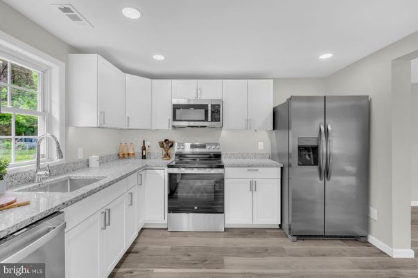 Interior, Kitchen, Recessed Lighting, Stainless Steel Appliances, Wood Texture Flooring