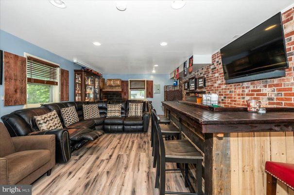 Interior, Living room, Recessed Lighting, Stone Walls, Wood Texture Flooring