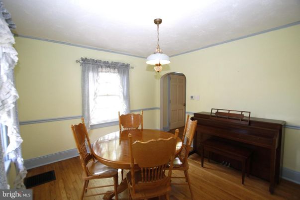 Dining room, Interior, Pendant Lights, Piano, Wood Texture Flooring