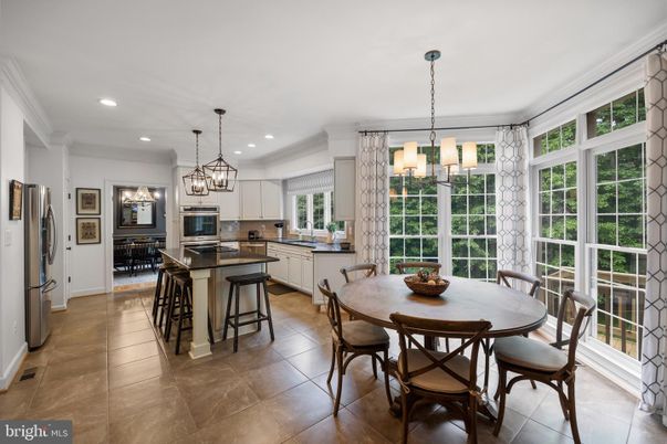 Chandelier, Dining room, Interior, Kitchen, Pendant Lights, Recessed Lighting, Stainless Steel Appliances