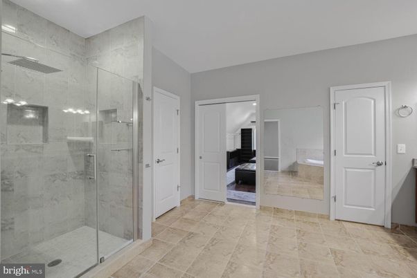 Bathroom, Glass Shower, Interior, Marble Walls, Recessed Lighting, Wood Texture Flooring